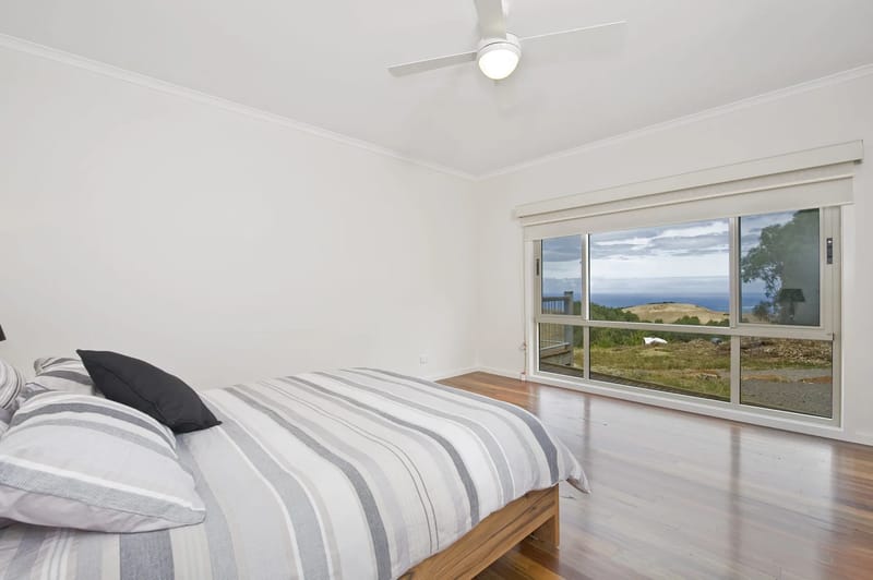 Queen bedroom with ocean views