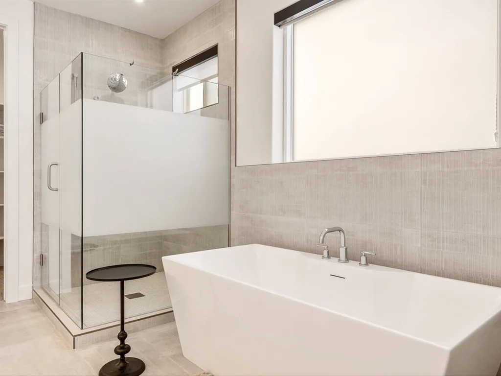 Second bathroom with tub and shower