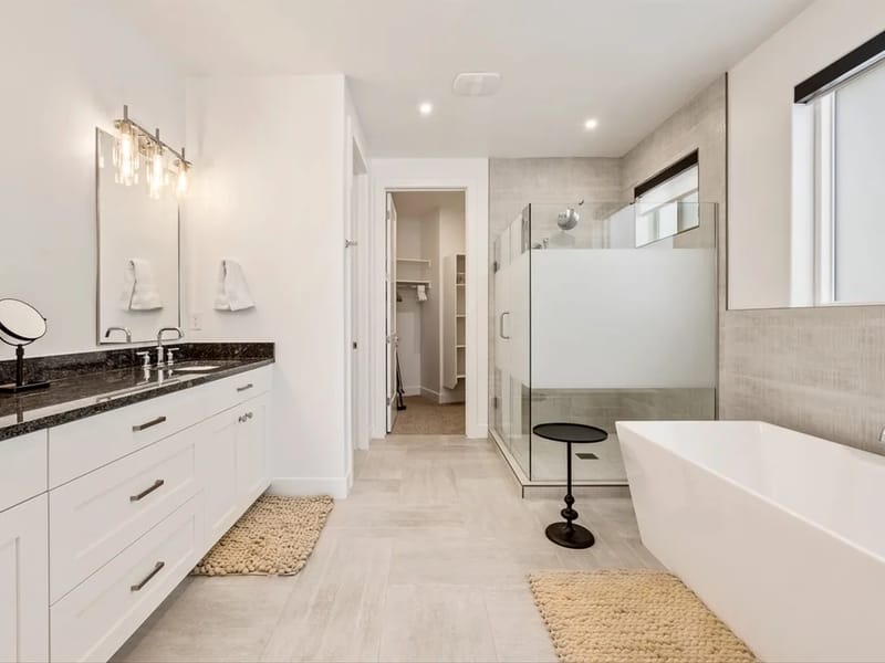 Bathroom with tub and shower