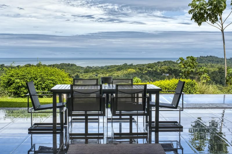 Casa Hacienda Jaguar · 43. This outdoor dining space on a reflective tiled terrace provides direct views of the surrounding jungle and ocean.