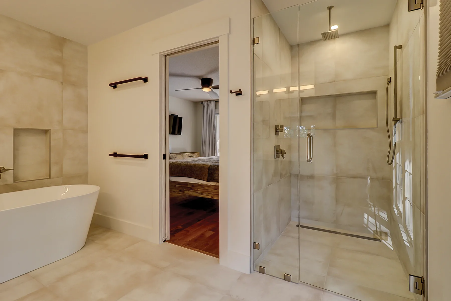 Suite bathroom with tub and shower