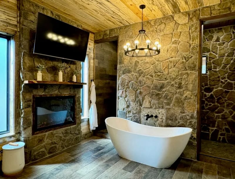 En-suite soaking tub and fireplace