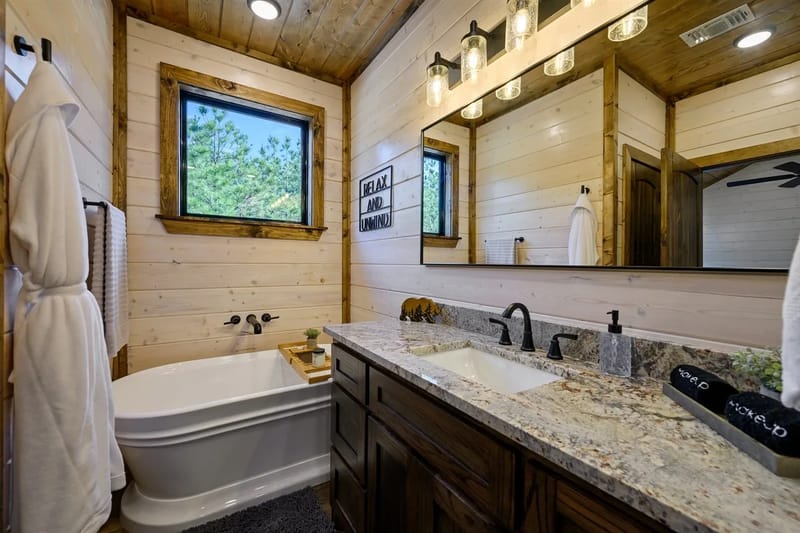 Bathroom with tub and double vanity