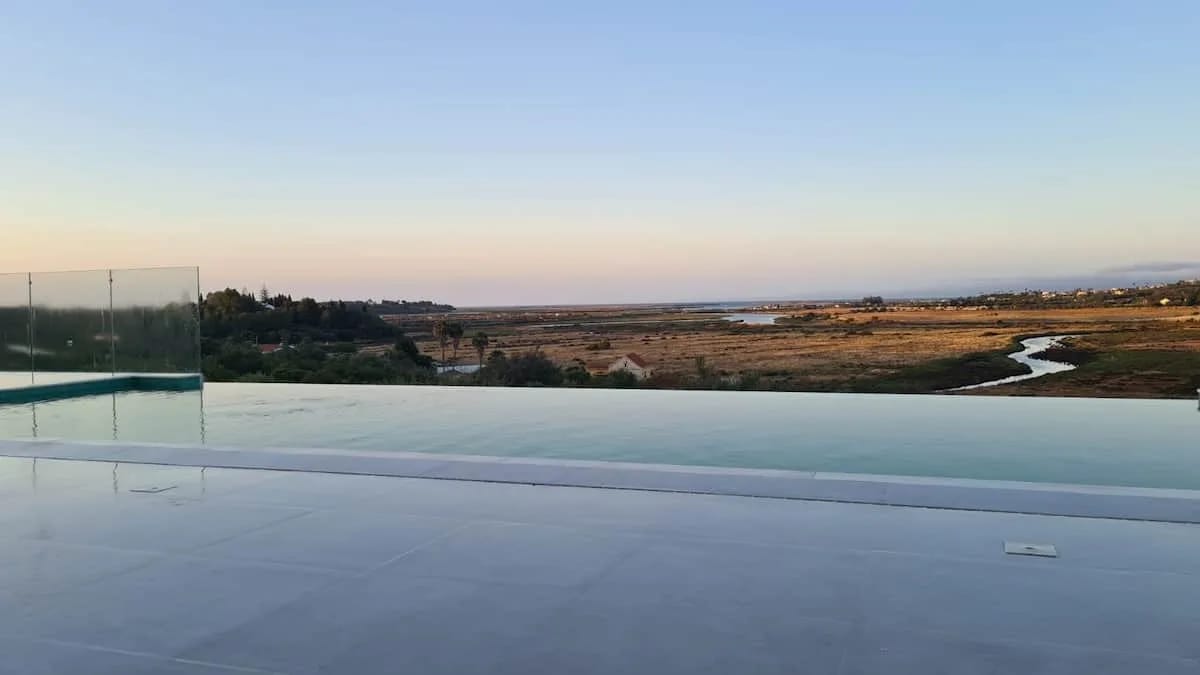 Infinity pool and estuary view