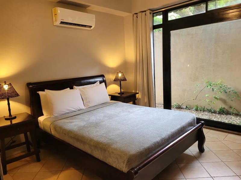 Bedroom with courtyard window
