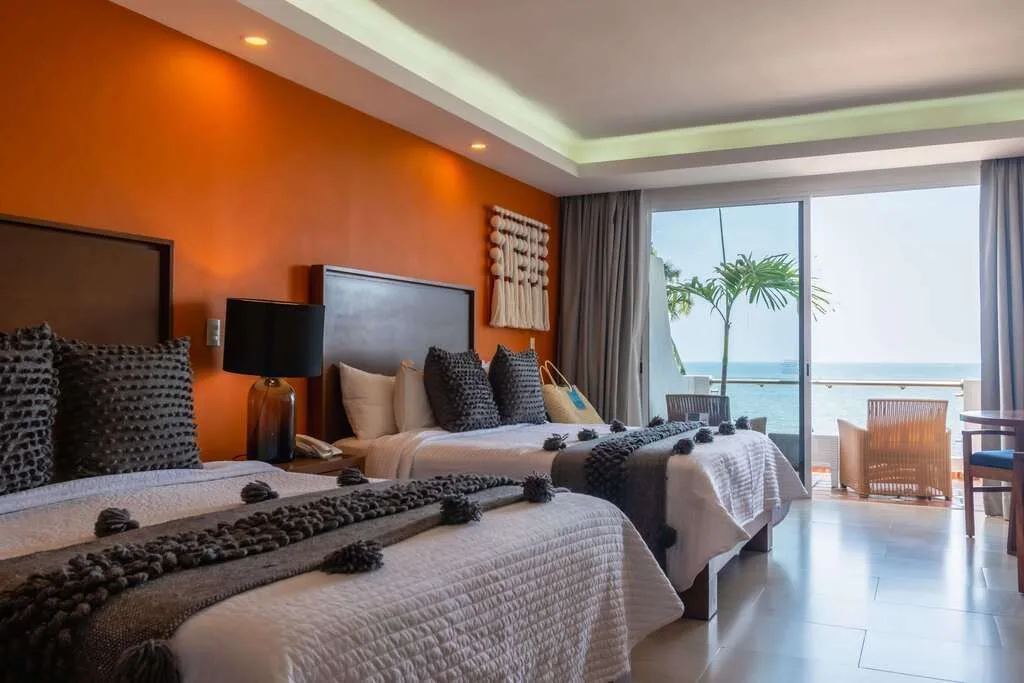 Suite prémium frente al mar con dos camas queen