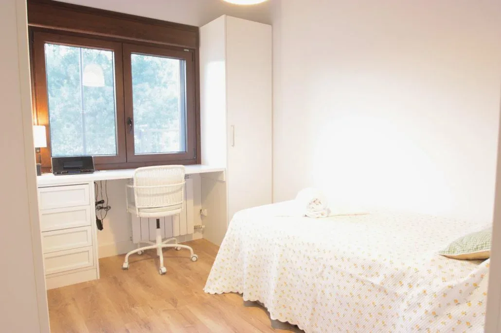 Bedroom with desk and valley views