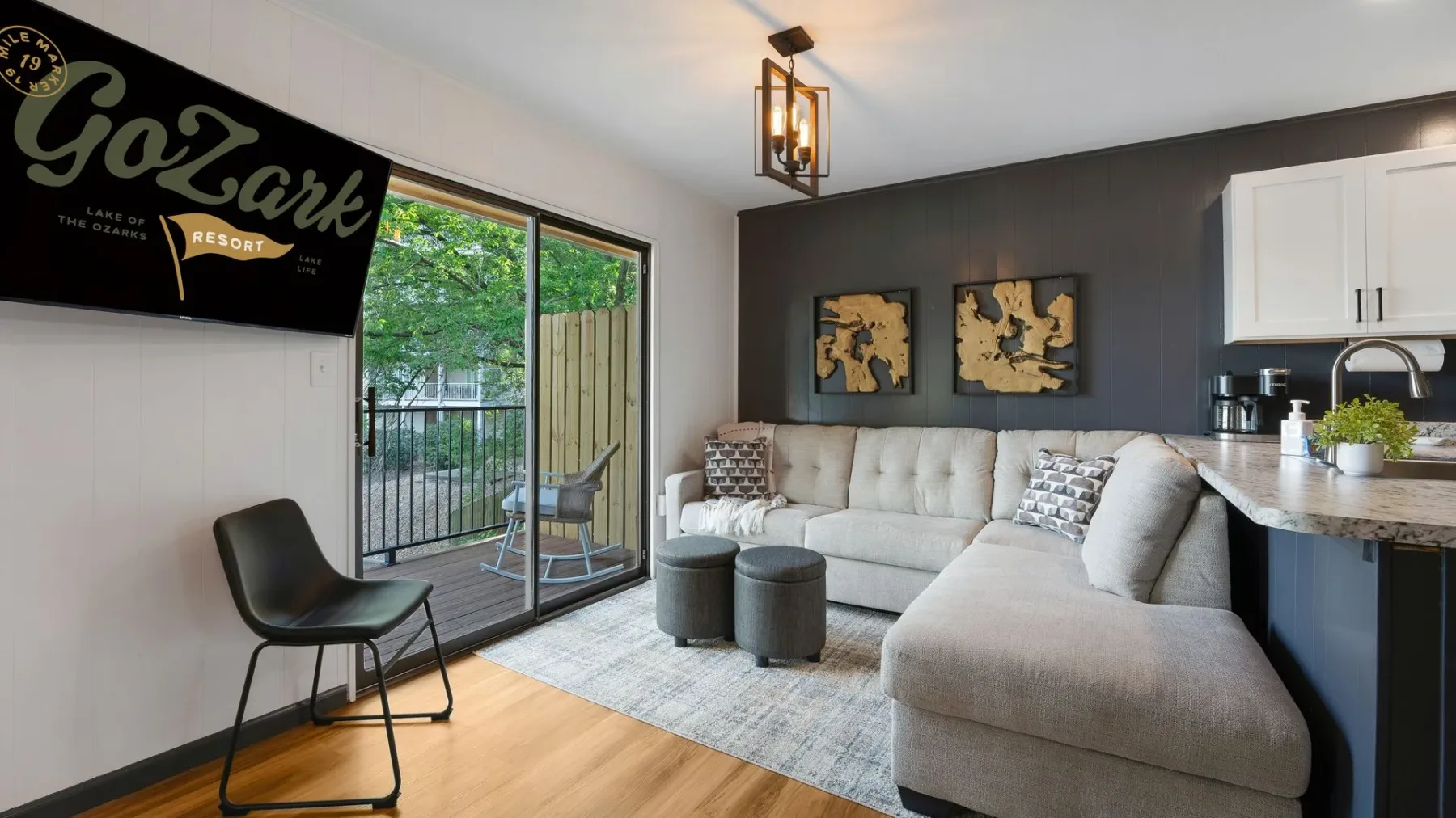 Living room with sectional sofa and sliding doors to patio
