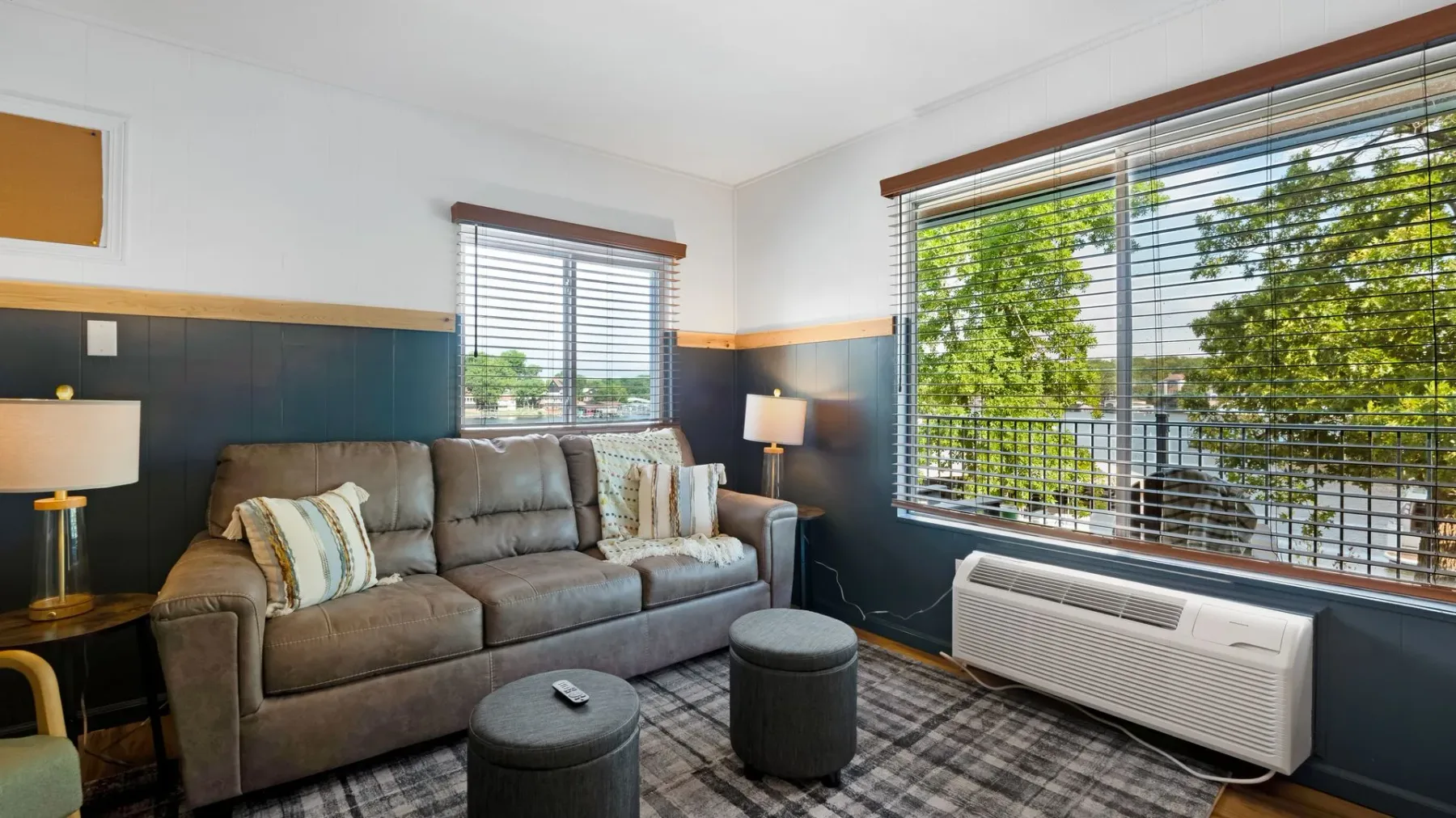 Living room with sofa and large window
