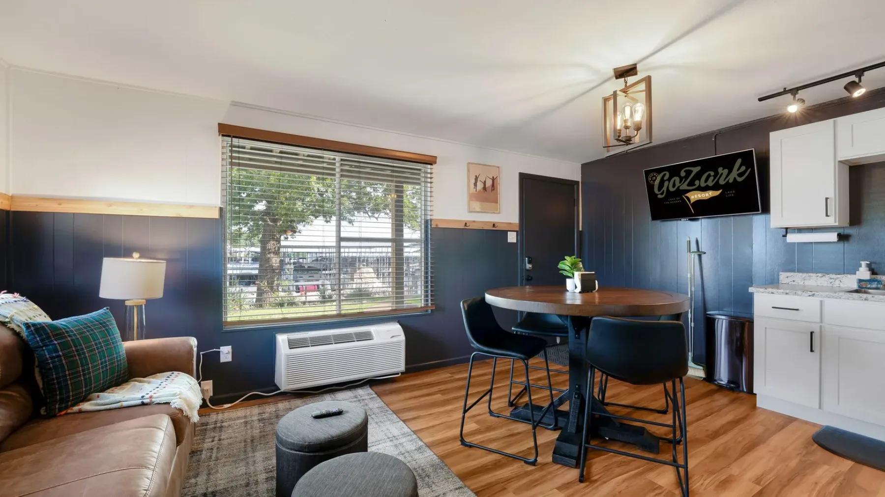 Living room and kitchen with dining table