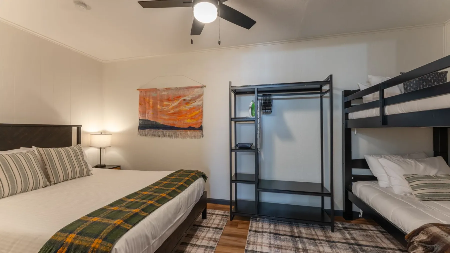 Bedroom with bed and bunk beds