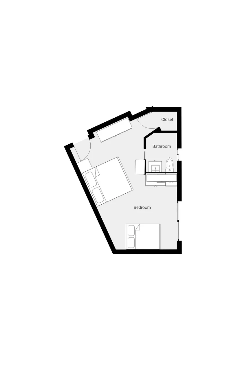 Un plano muestra un dormitorio, un baño y un armario.