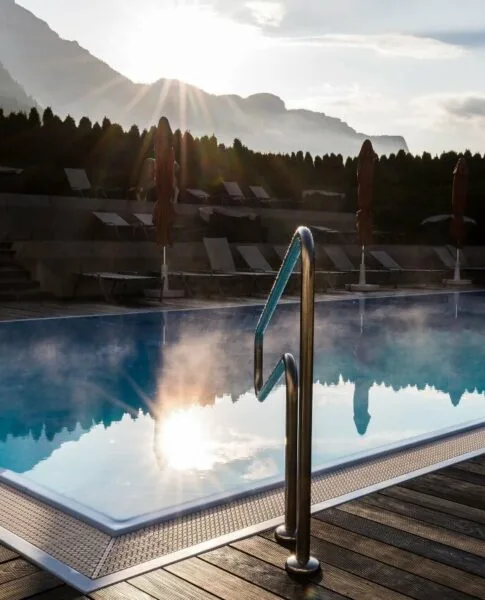 Outdoor pool at sunrise