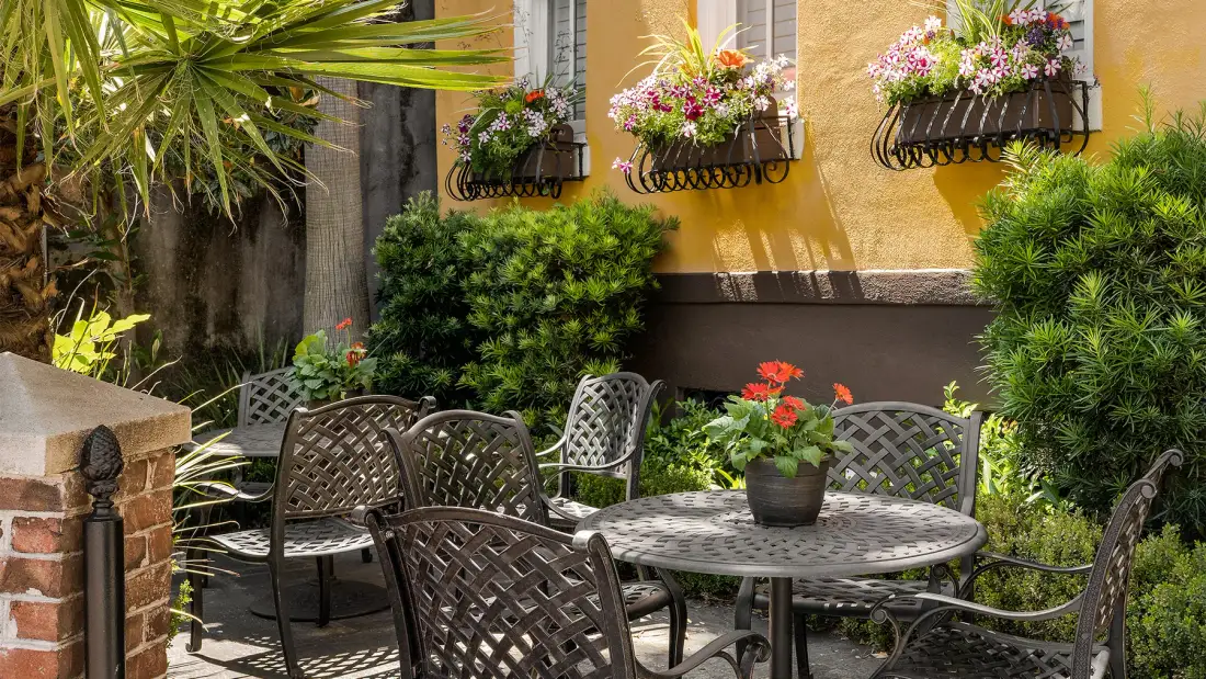 Outdoor table and chairs beside the inn