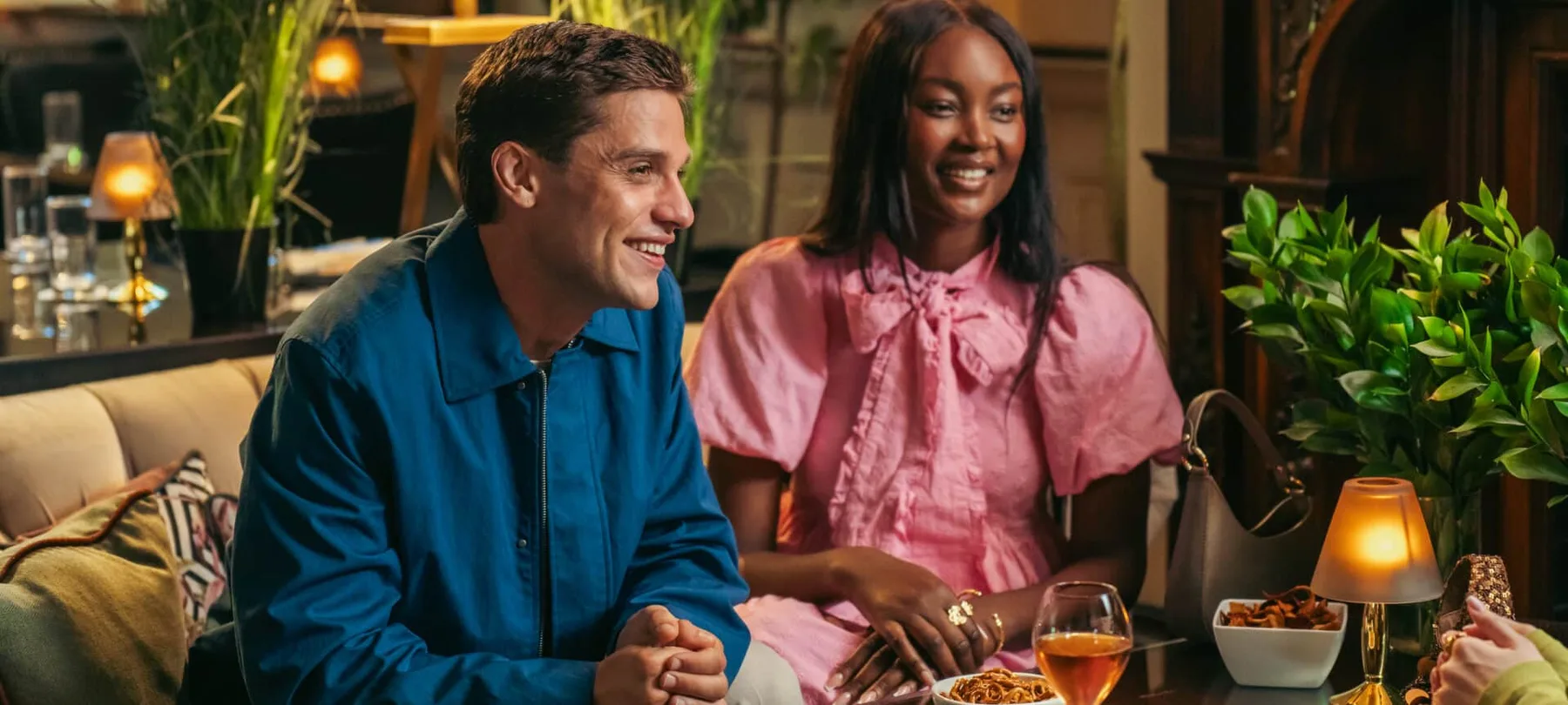 Guests enjoying drinks and snacks in Monk’s Lounge