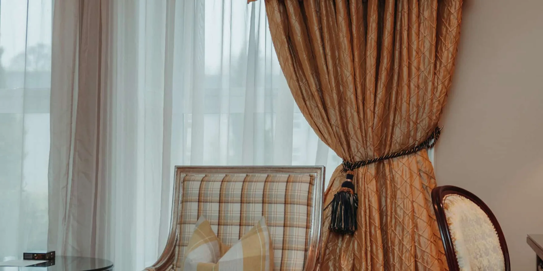 Junior Suite seating area by a window