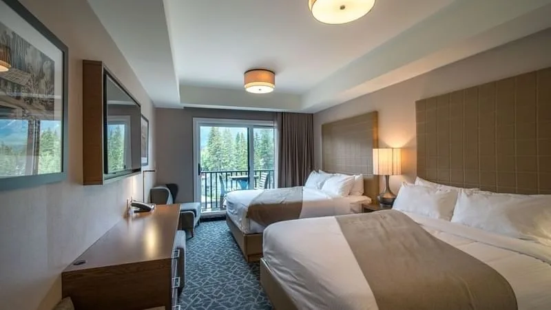 Interior of Premium Double Queen bedroom at Malcolm Hotel