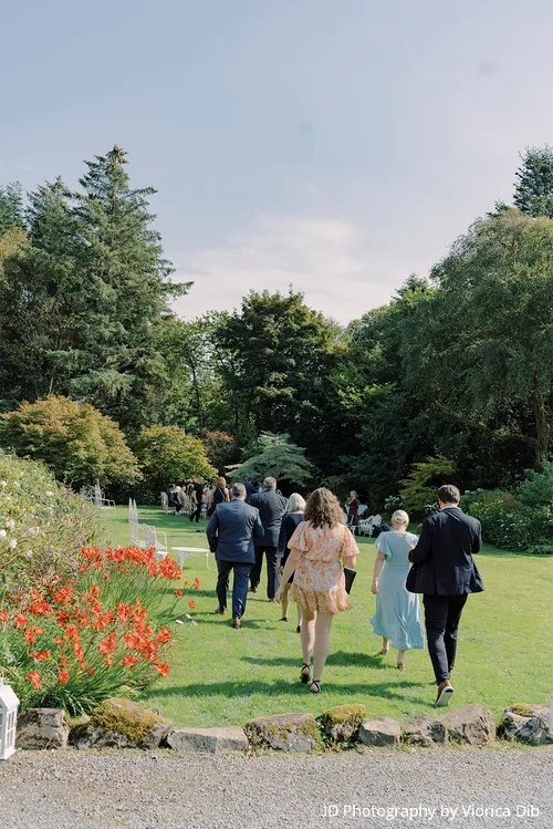 Wedding guests on the front lawn