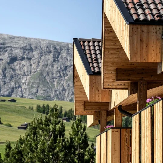 Hotel Rosa against a mountain backdrop.