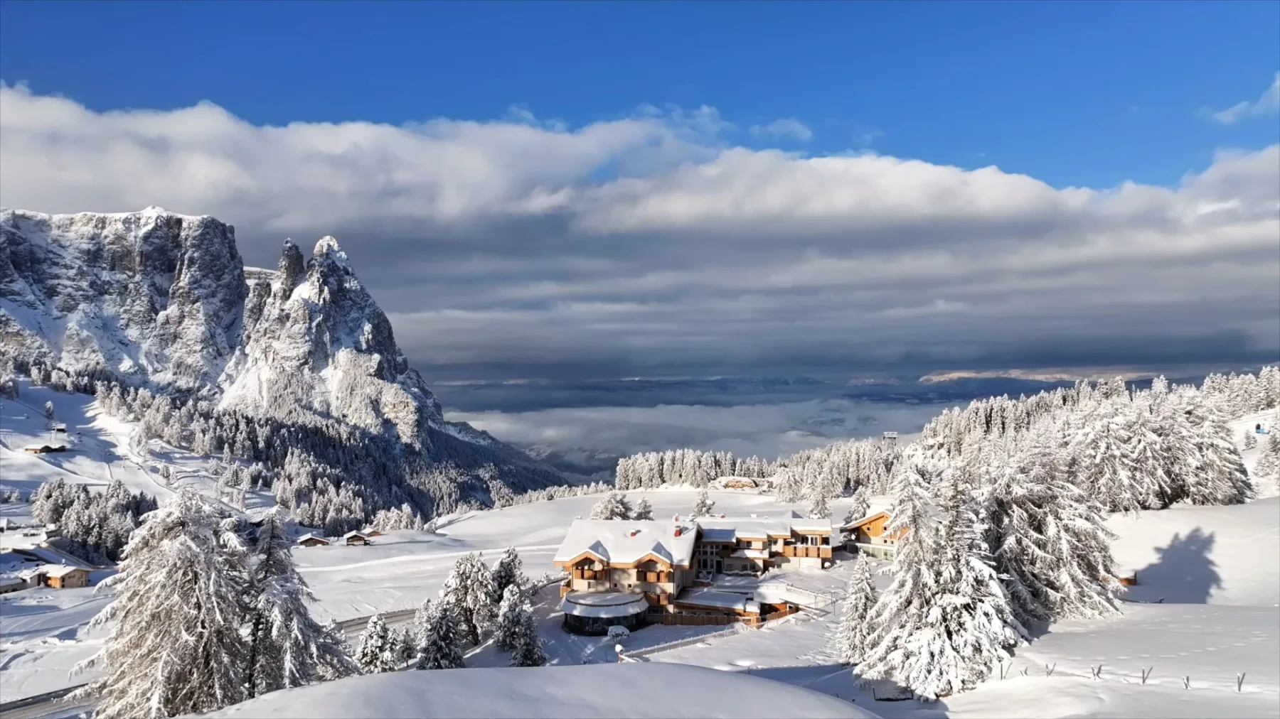 Hotel Rosa in a snowy mountain landscape.