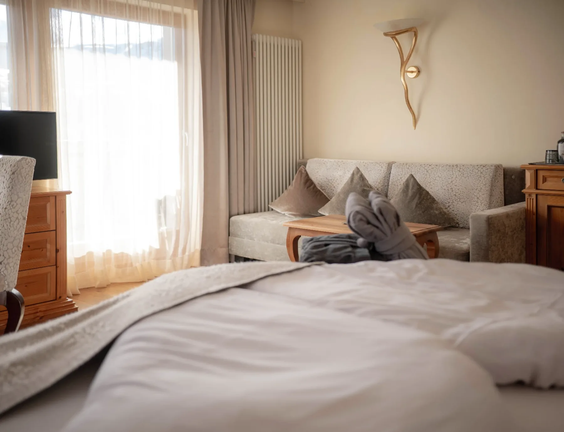 Panorama Superior room with bed and seating area.