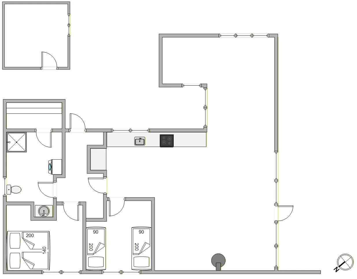 Plano de una casa con varias habitaciones, camas y una amplia zona diáfana.