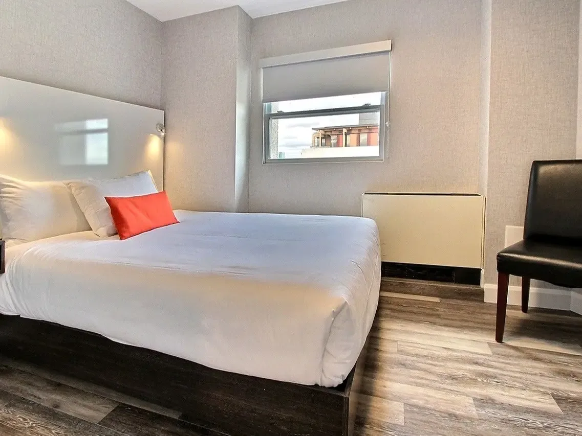Suite con tres camas queen