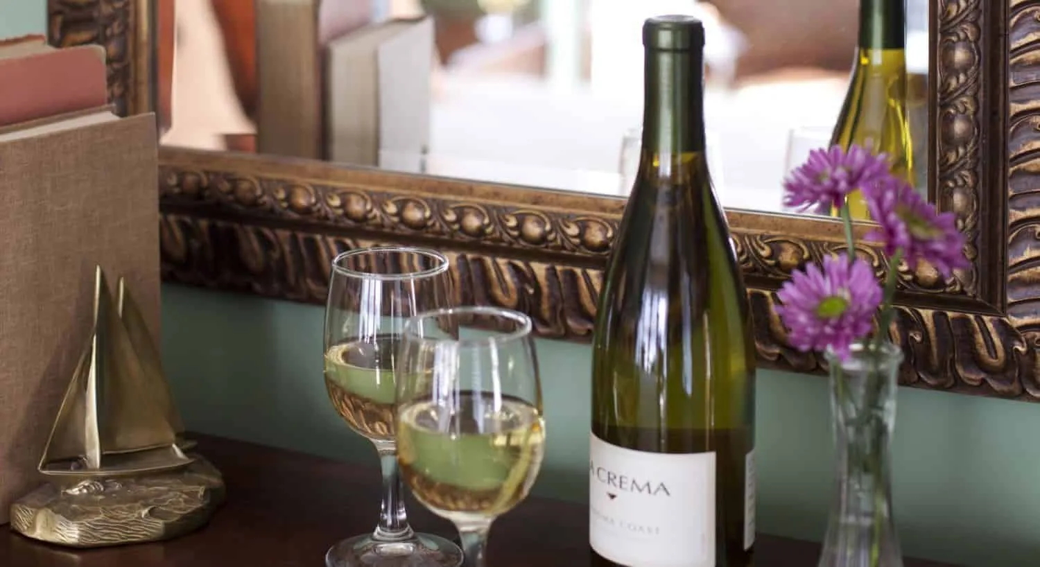 Wine and flowers arranged in the Pemaquid Point room