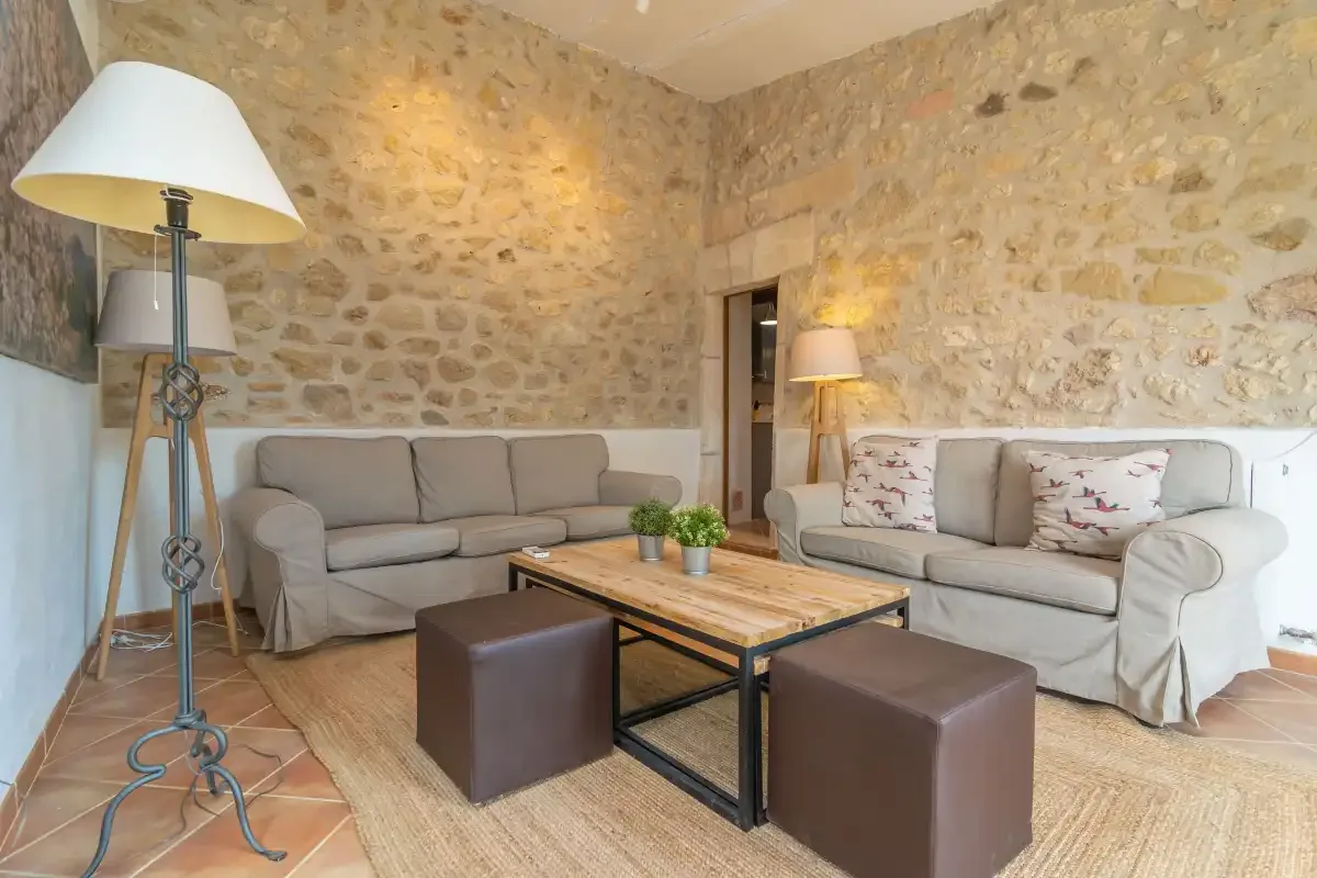 A living room with seating arranged around a coffee table.