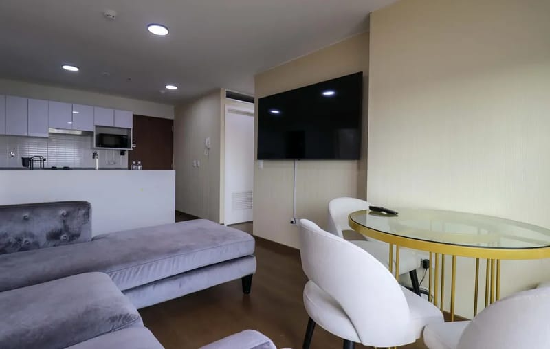Elegant 2BR Haven w/ Private Balcony & Panoramic City Views