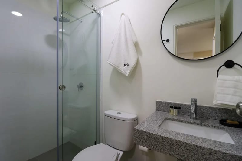 Elegant 2BR Haven w/ Private Balcony & Panoramic City Views