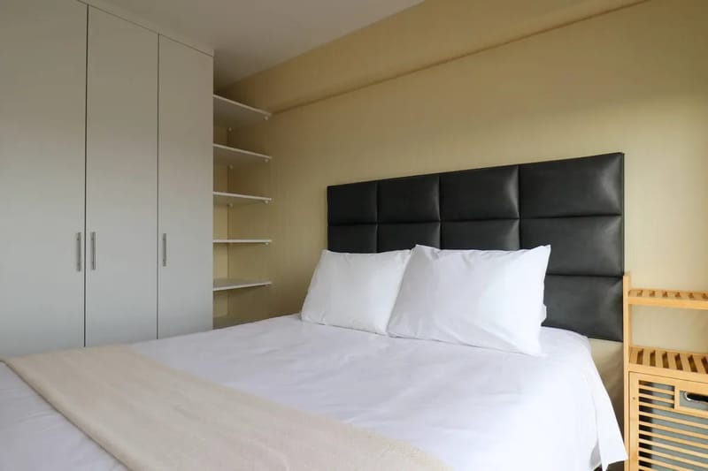 Elegant 2BR Haven w/ Private Balcony & Panoramic City Views