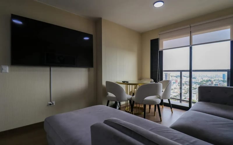 Elegant 2BR Haven w/ Private Balcony & Panoramic City Views
