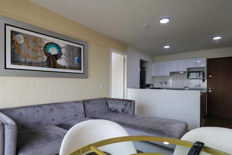 Elegant 2BR Haven w/ Private Balcony & Panoramic City Views