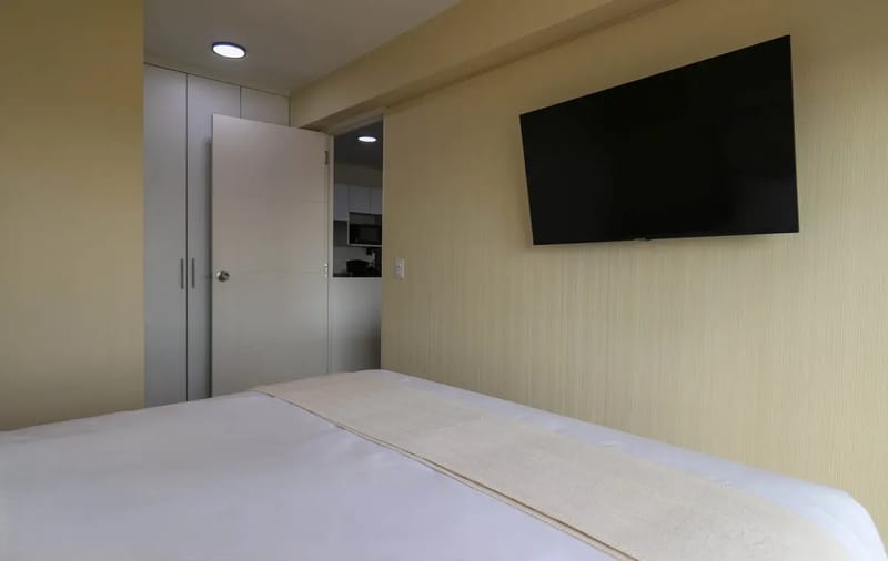 Elegant 2BR Haven w/ Private Balcony & Panoramic City Views