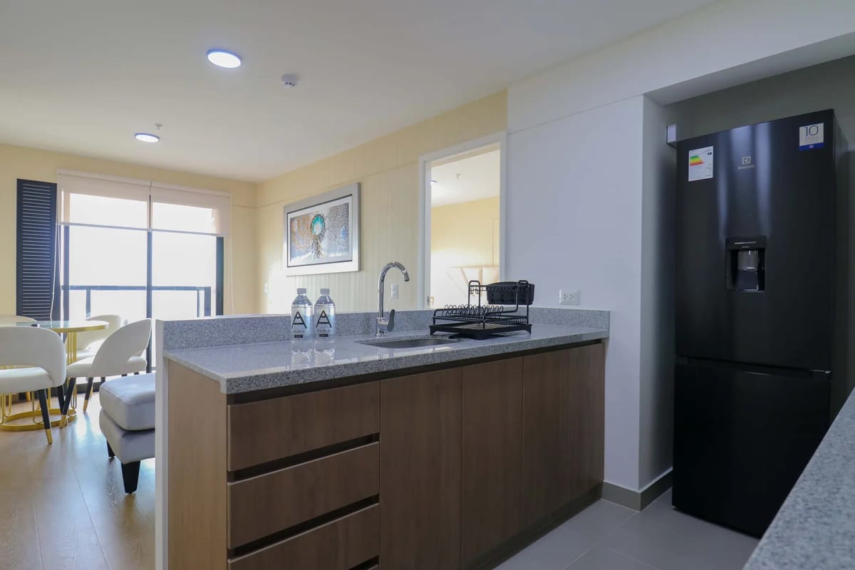 Elegant 2BR Haven w/ Private Balcony & Panoramic City Views