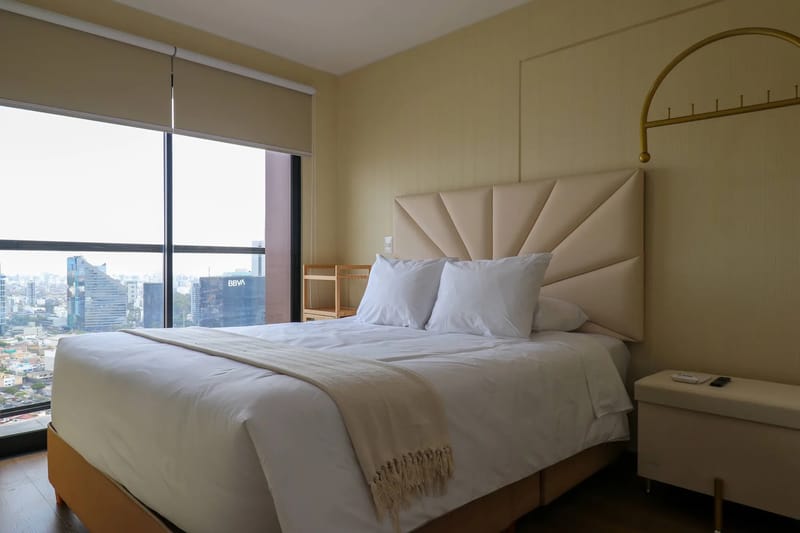 Elegant 2BR Haven w/ Private Balcony & Panoramic City Views