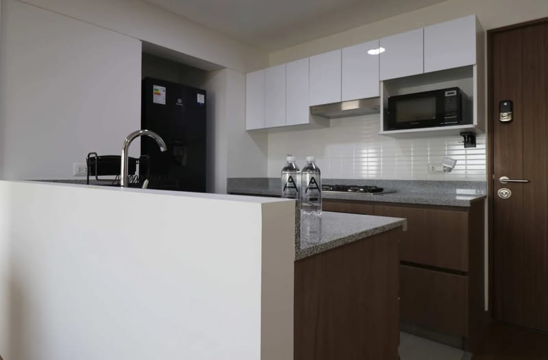 Elegant 2BR Haven w/ Private Balcony & Panoramic City Views