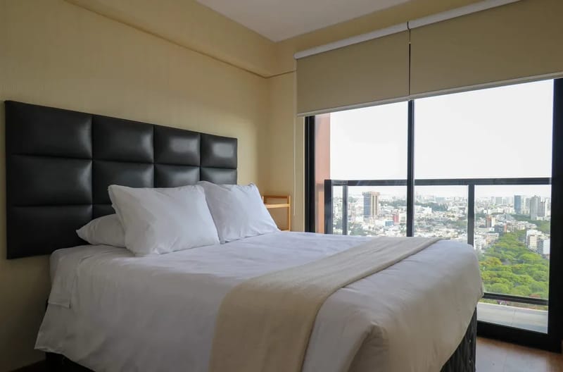 Elegant 2BR Haven w/ Private Balcony & Panoramic City Views