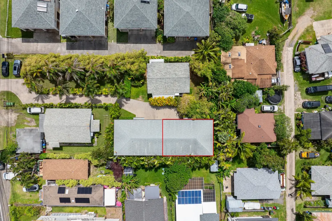 Aerial view of a residential neighborhood with a highlighted property.
