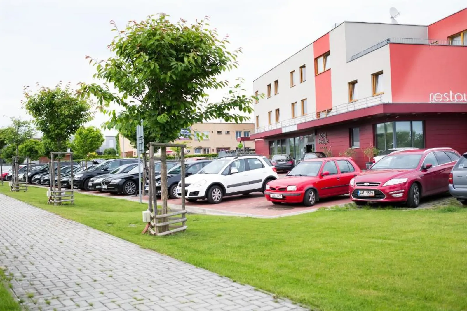 Ground-level view of the hotel parking lot