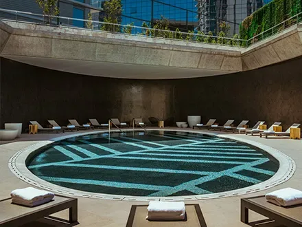 Pool with daybeds.