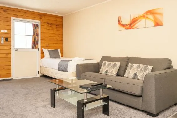 Cama individual del estudio con cama king