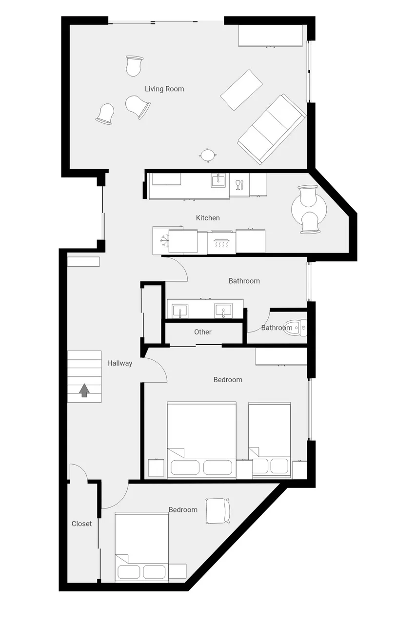 Un plano muestra una sala de estar, cocina, baños y dormitorios.