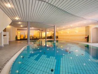 Indoor swimming pool at Hotel Zamangspitze