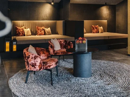 Modern sitting area with velvet chairs