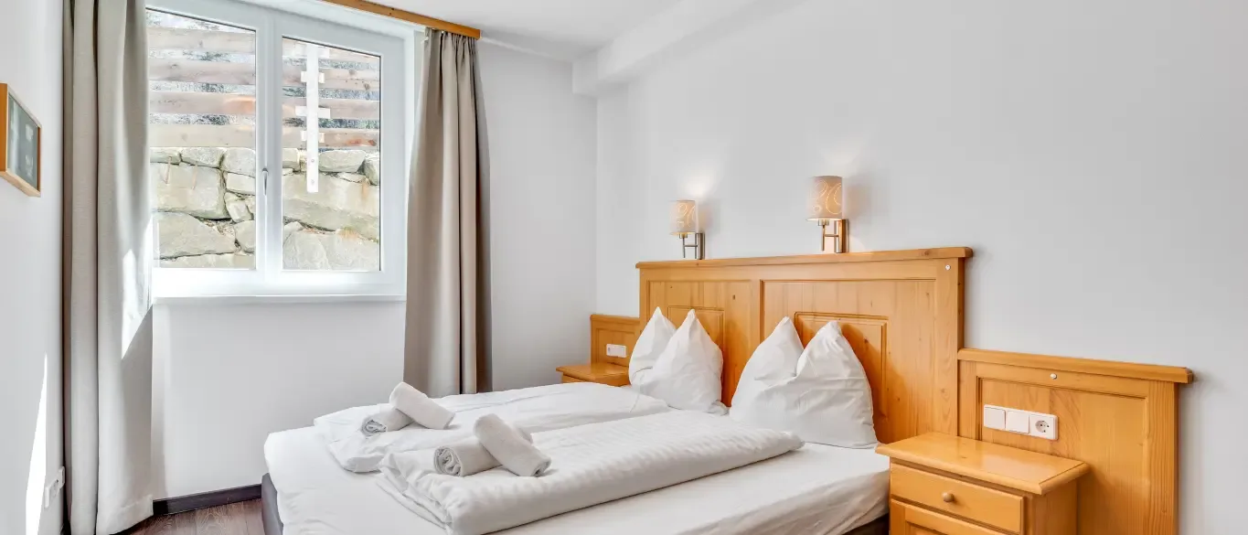 Bright room with double bed and window