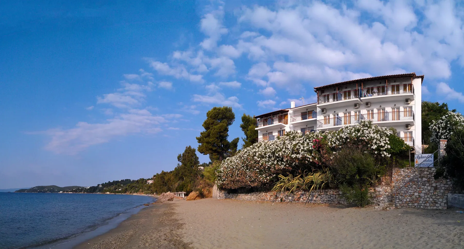 Aphrodite Skiathos buildings viewed from the beach