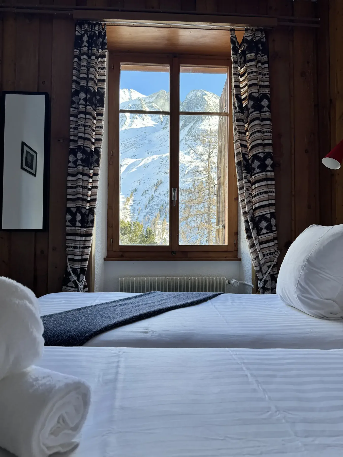 Room view of snow-covered mountain peaks
