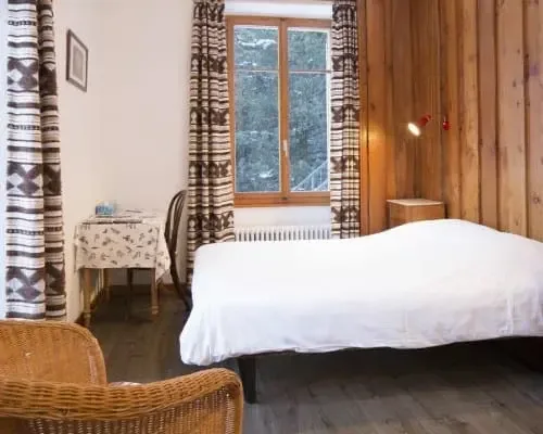 Forest-view room with Swiss stone pine wood